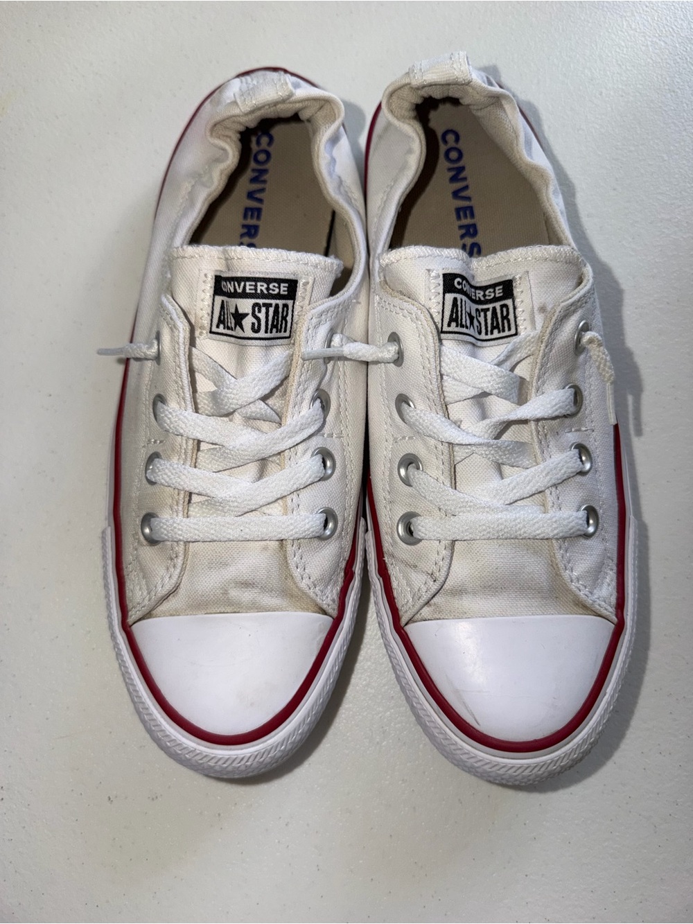 Converse Women’s White Low Top All Star Sneakers with Red Trim